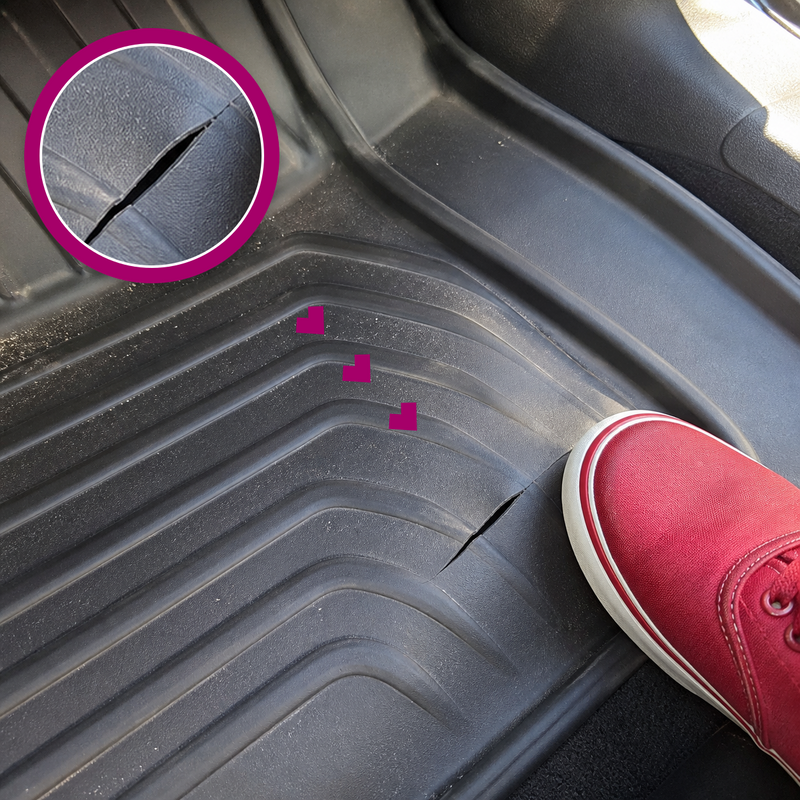 Irregular cut in a molded black vinyl car floor mat, with a matching magenta magnified close-up and a red shoe beside it.