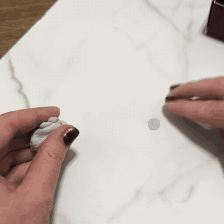 Rebuilding a tile or stone chip, hole, or damaged edge with epoxy putty